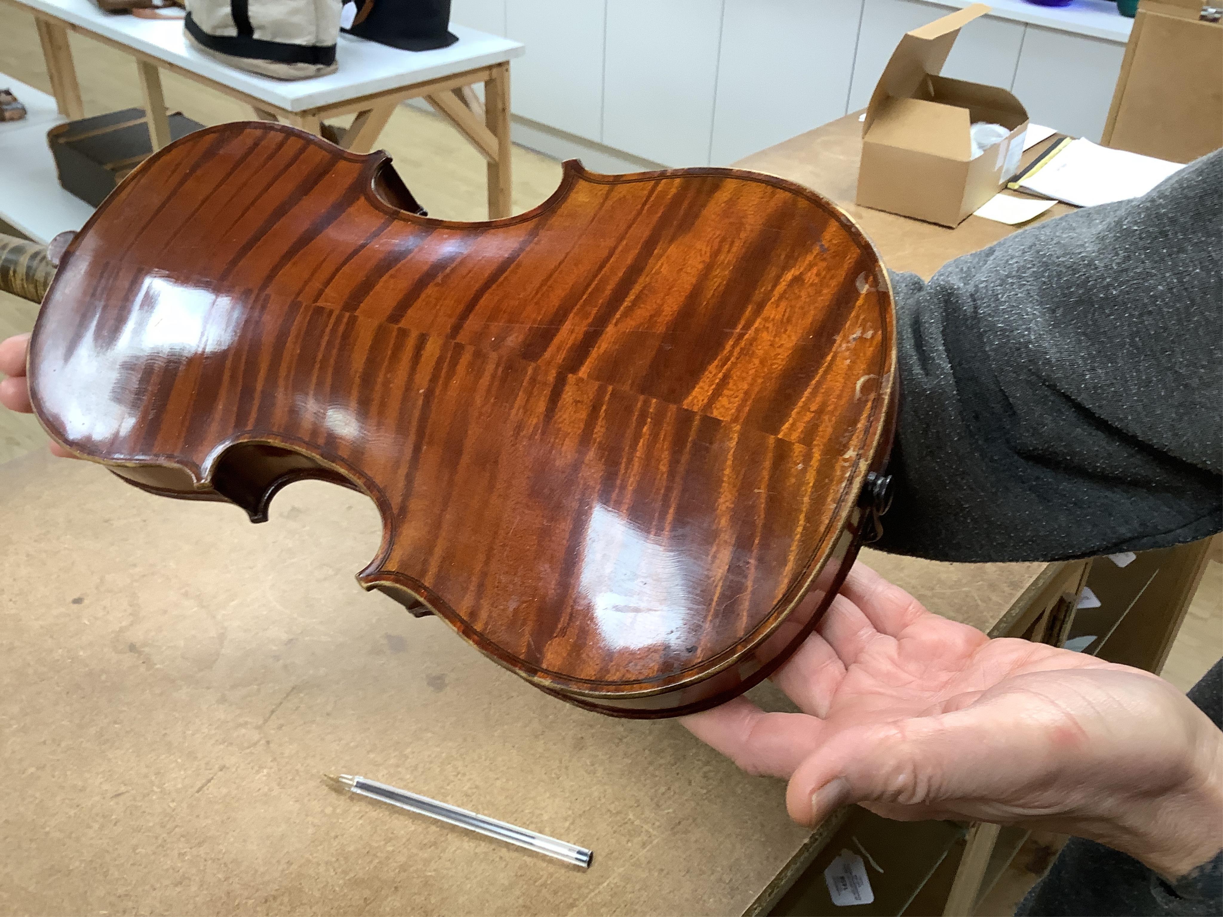 A late 19th century French Chipot-Vuillaume violin, with Edward Withers case, back measures 36cm.